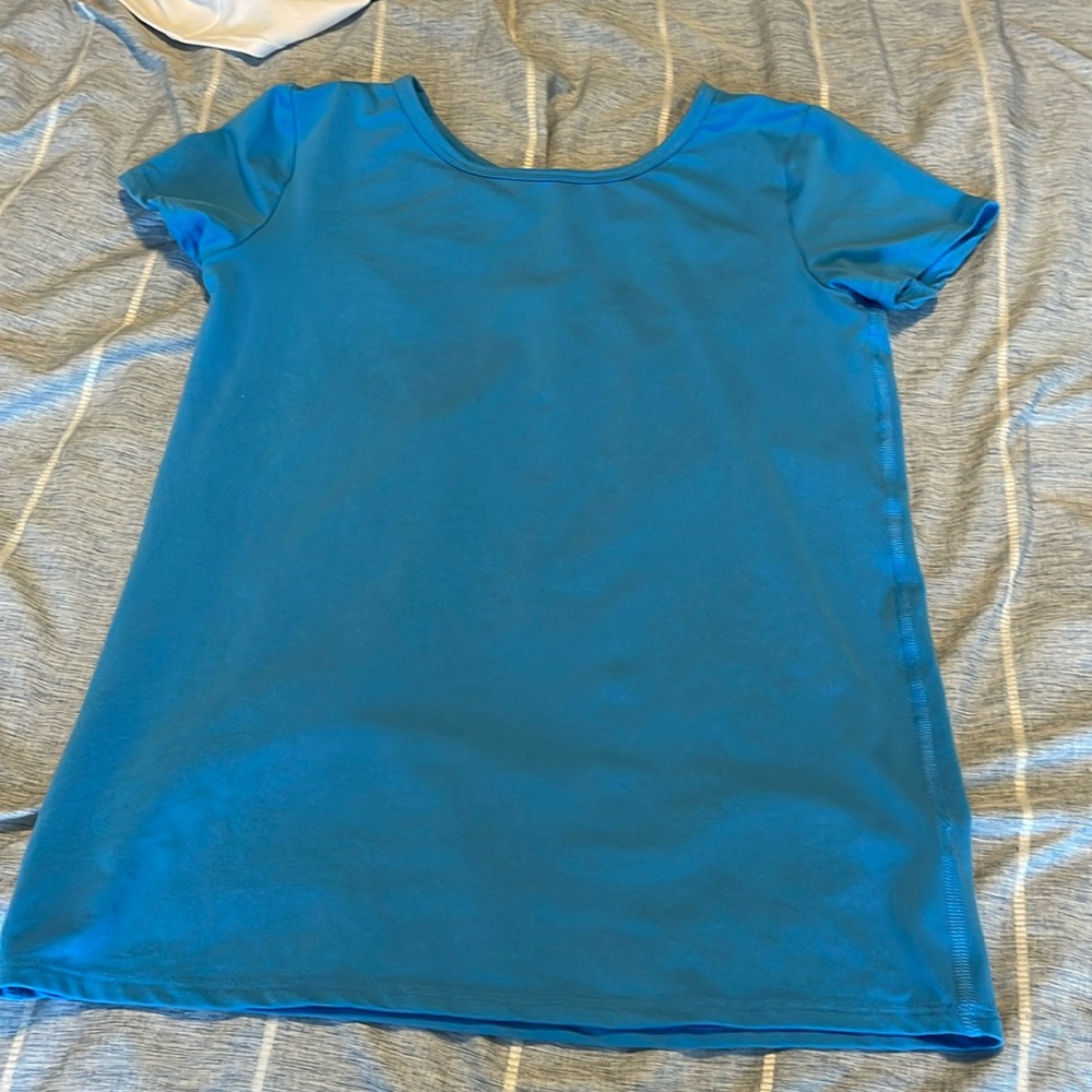 All in motion blue athletic top. Size L in girls